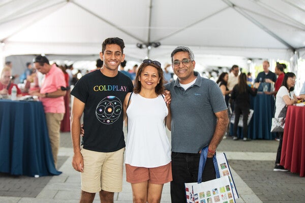 penn family in tent during an orientation event