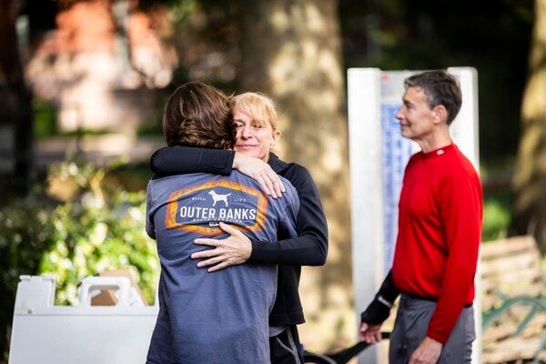 parent hugging child during move-in